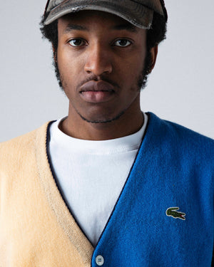Oz wearing our Lacoste Chemise colour block cardigan 80's