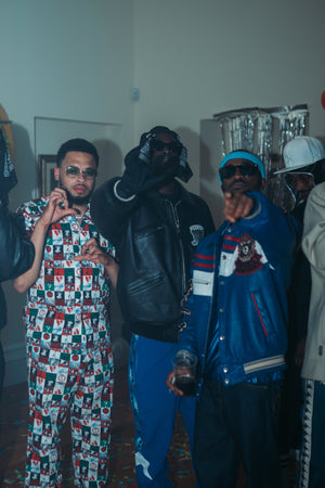 Unknown T, Billy Billions & Stally wearing our archive Avirex's & Moschino on set for 'Chingy'
